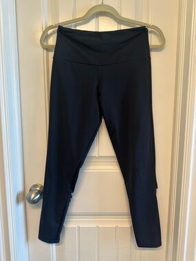 Onzie Black Yoga or dance Leggings cutouts on back calf.